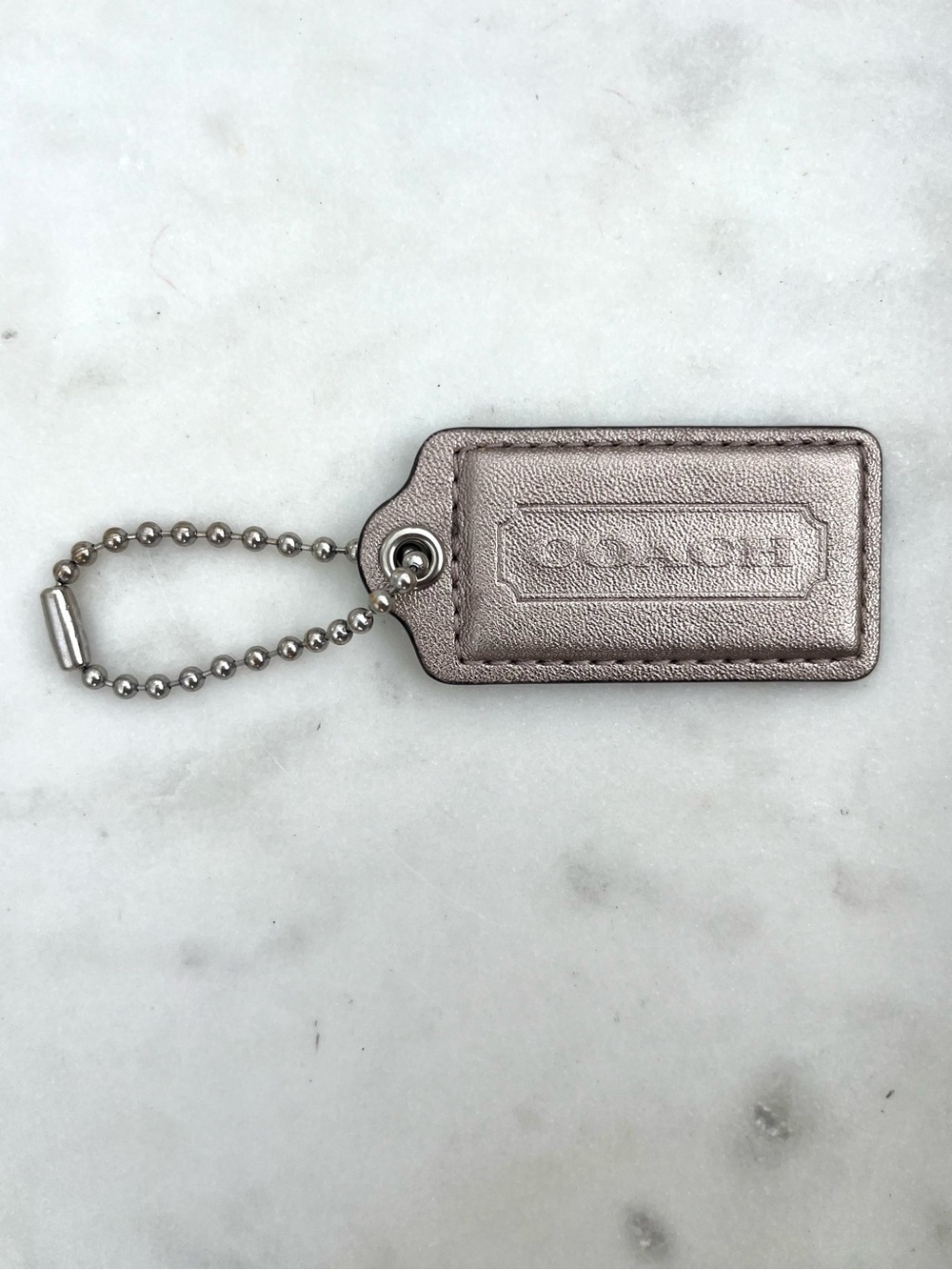 COACH Vintage Metallic Leather Hang Tag, Silver Gold